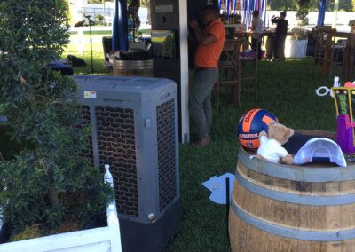 Outdoor event tent with bar and equipment.