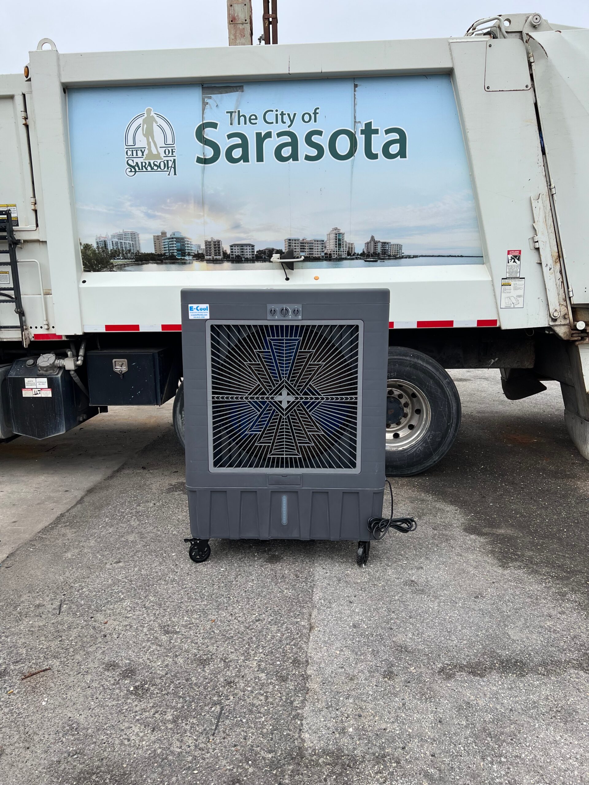 City of Sarasota garbage truck with portable fan.