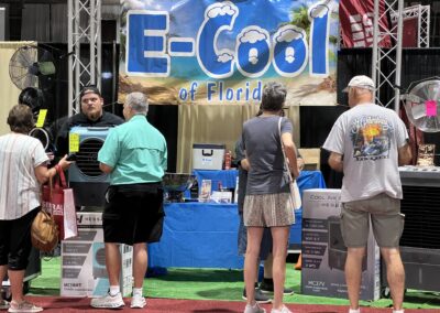 E-Cool booth displaying air coolers at event.