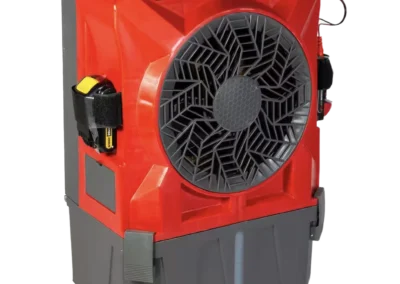 Portable red and black air cooler with fan grille.