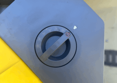 Close-up of a power dial on a device.